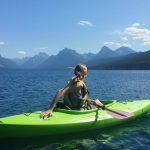 kayaking with mountain background