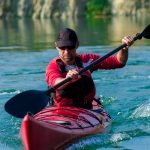 Man kayaking in beautiful scenery